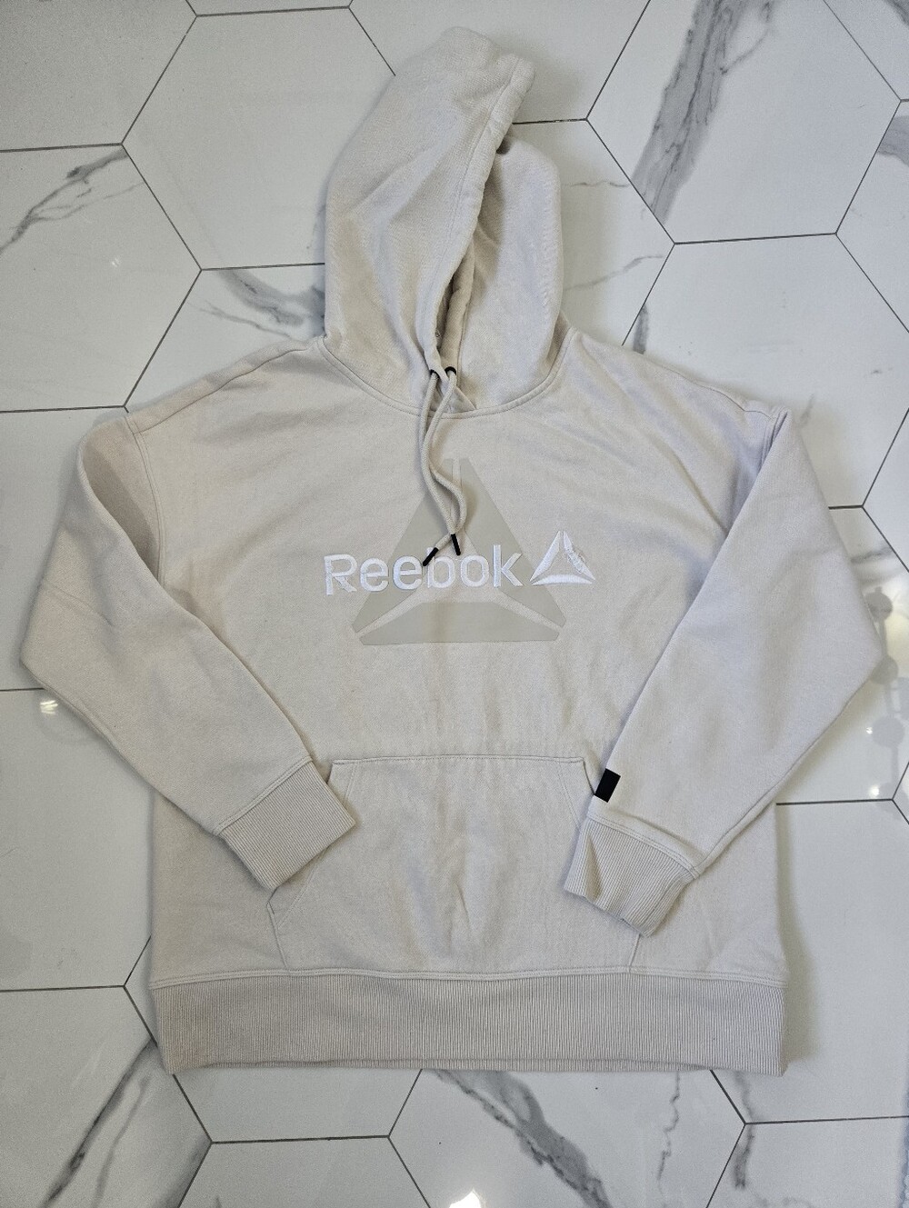 Reebok Women's Cream Pullover Hoodie with Logo.